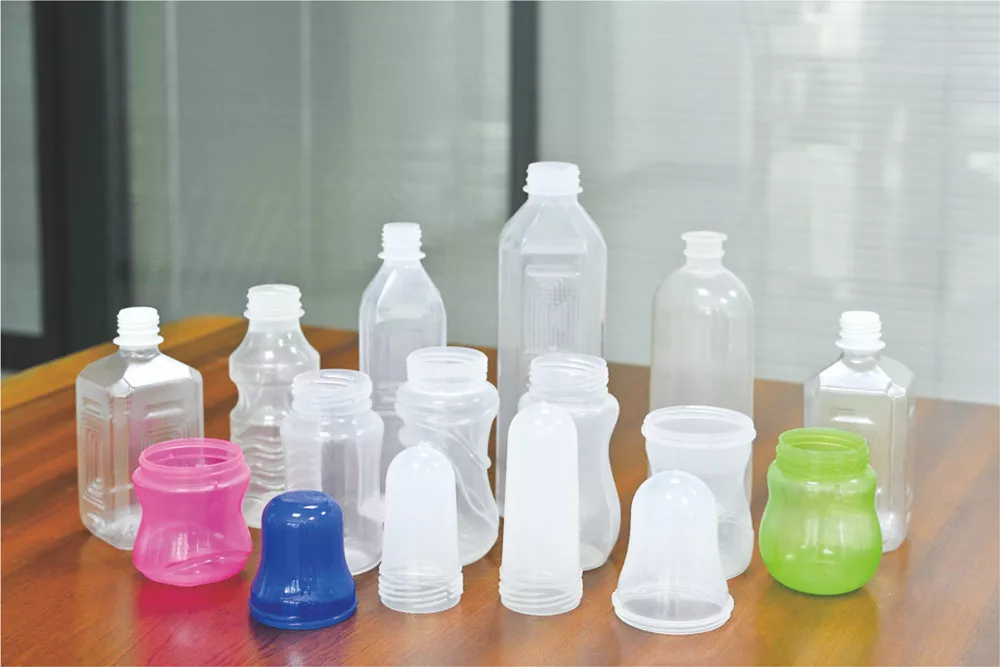 Beverage bottle blowing machine